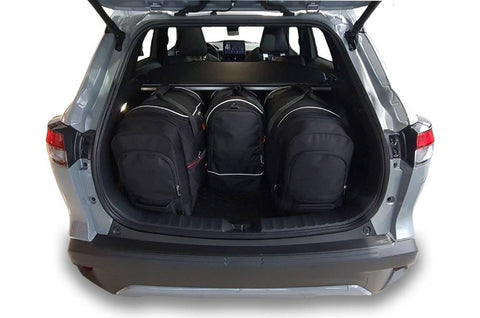 Reistassen Set op maat TOYOTA COROLLA CROSS HEV 2022+, 30% meer bagageruimte, 4 tassen (2 trolleys, 1 sporttas, 1 handbagage), gratis verzending NL & BE, 3 jaar garantie.